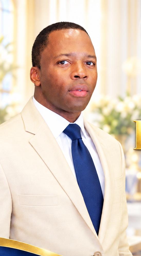 Prophet Kerceus André in a light suit and blue tie